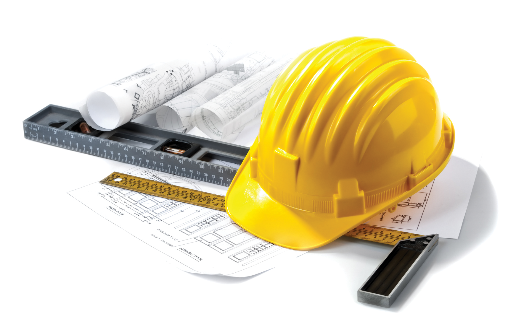 Contractor hard hat and ruler to represent the use of System 15 on jobsite and being specifies