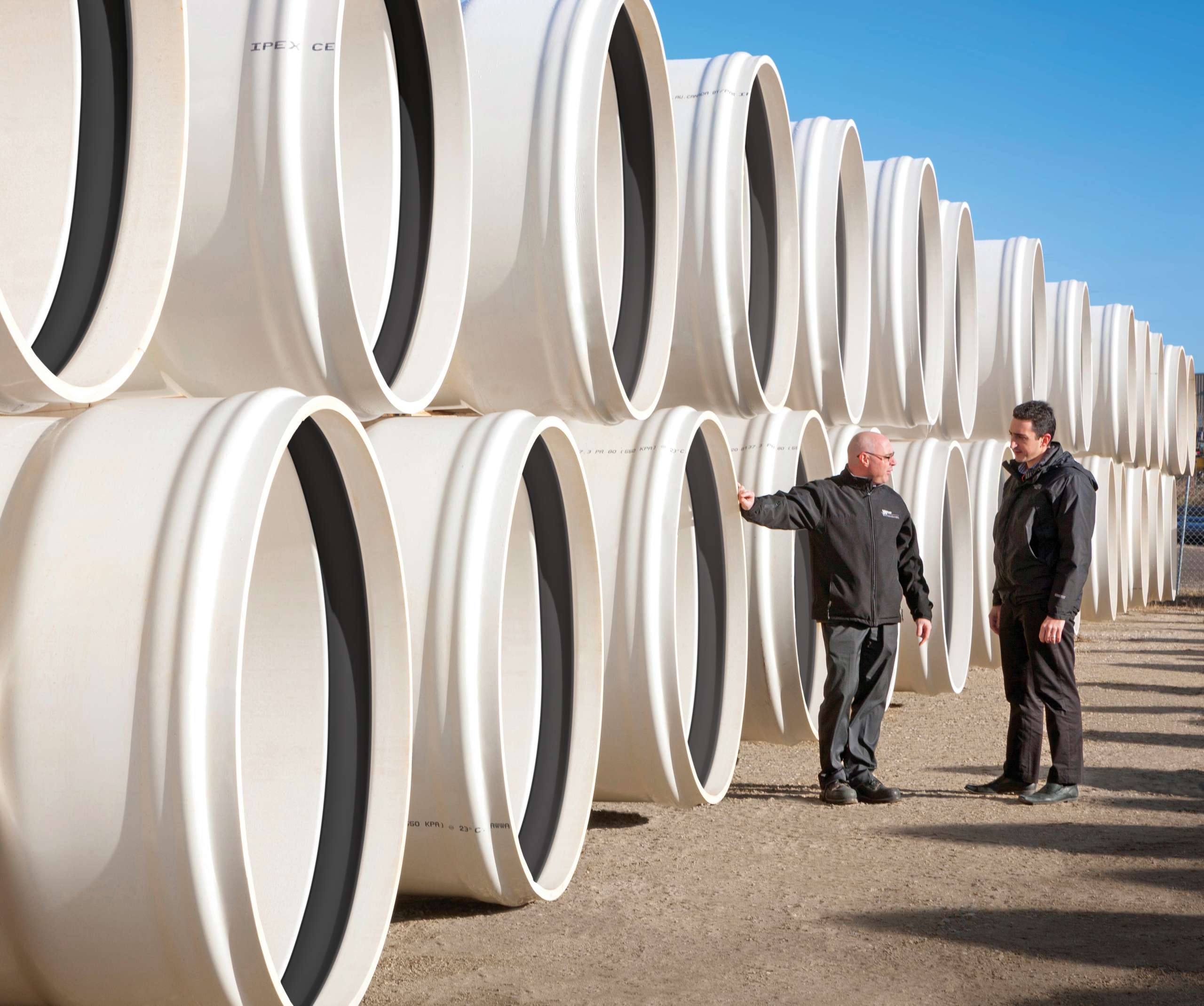 IPEX Centurion Pipe stacked on the ground