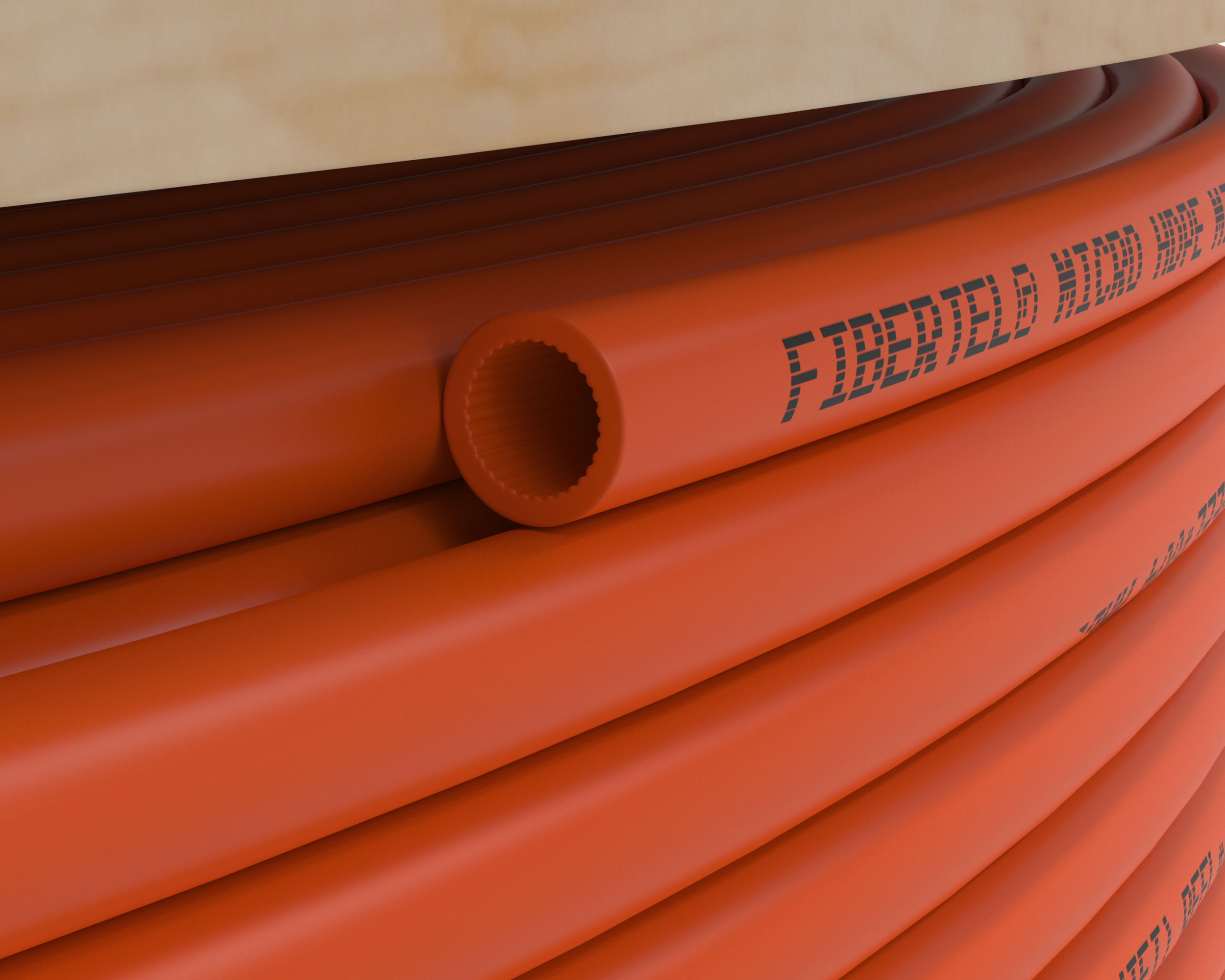 Upclose view of orange Fibertel HDPE pipe roll